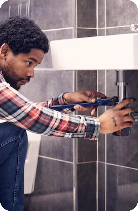 A plumber at work